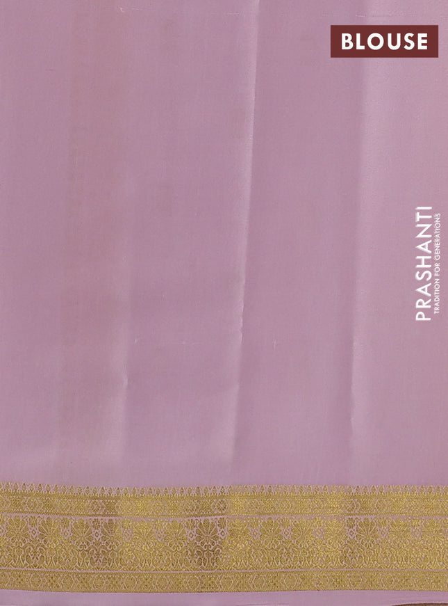 Pure mysore silk sareee dark green and mild peach pink with allover zari woven buttas and zari woven border