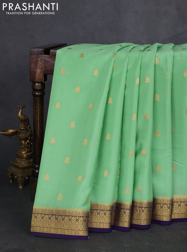 Pure mysore silk sareee pista green and violet with allover zari woven buttas and zari woven border