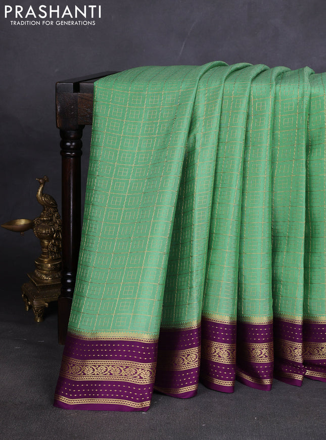 Pure mysore silk sareee pastel green and purple with allover zari woven geometric weaves and zari woven border