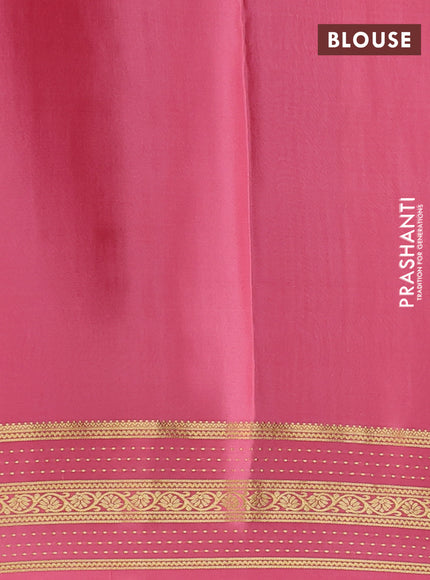 Pure mysore silk sareee bottle green and peach pink with allover zari woven geometric weaves and zari woven border
