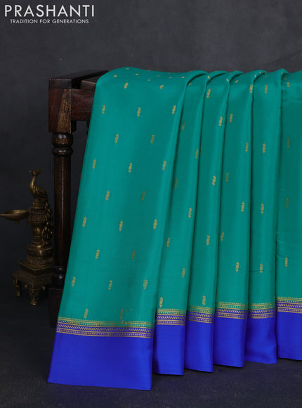 Pure mysore silk sareee teal green and royal blue with zari woven buttas and zari woven simple border
