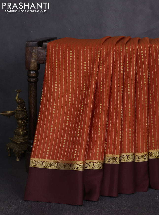 Pure mysore silk sareee rustic orange and coffee brown with allover zari weaves and zari woven simple border