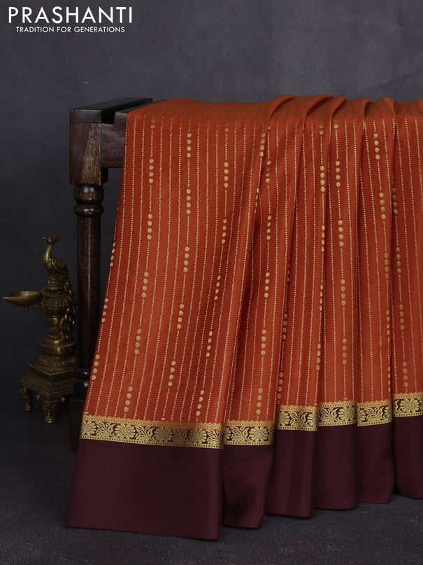 Pure mysore silk sareee rustic orange and coffee brown with allover zari weaves and zari woven simple border