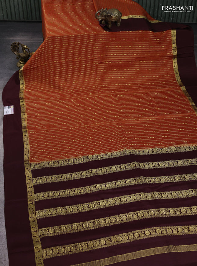 Pure mysore silk sareee rustic orange and coffee brown with allover zari weaves and zari woven simple border
