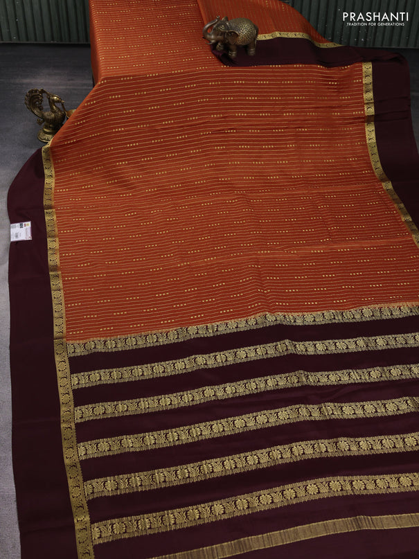 Pure mysore silk sareee rustic orange and coffee brown with allover zari weaves and zari woven simple border
