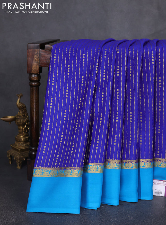 Pure mysore silk sareee blue and cs blue with allover zari weaves and zari woven simple border