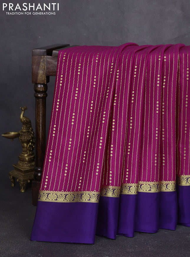 Pure mysore silk sareee magenta pink and dark blue with allover zari weaves and zari woven simple border