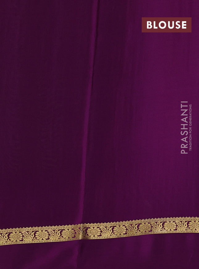 Pure mysore silk sareee green and purple with allover zari weaves and zari woven simple border