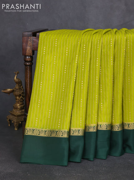 Pure mysore silk sareee lime green and bottle green with allover zari weaves and zari woven simple border