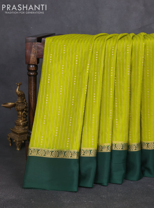 Pure mysore silk sareee lime green and bottle green with allover zari weaves and zari woven simple border