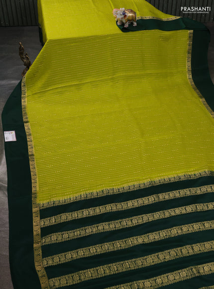 Pure mysore silk sareee lime green and bottle green with allover zari weaves and zari woven simple border