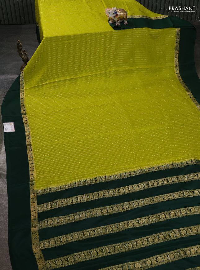 Pure mysore silk sareee lime green and bottle green with allover zari weaves and zari woven simple border