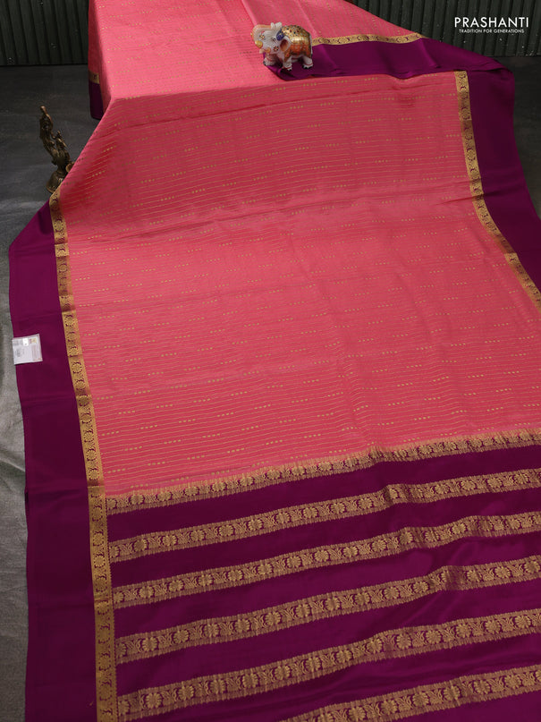 Pure mysore silk sareee peach pink and purple with allover zari weaves and zari woven simple border
