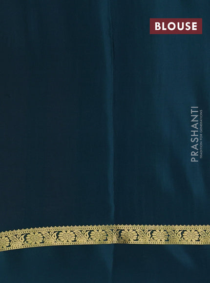 Pure mysore silk sareee peach orange and peacock green with allover zari weaves and zari woven simple border