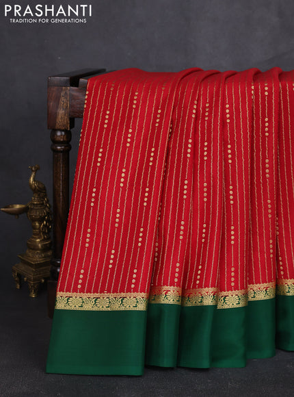 Pure mysore silk sareee red and green with allover zari weaves and zari woven simple border