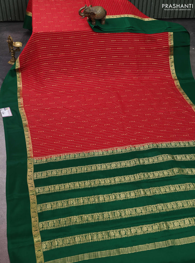 Pure mysore silk sareee red and green with allover zari weaves and zari woven simple border