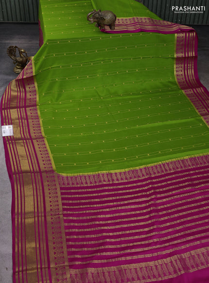 Pure mysore silk sareee mehendi green and pink with allover zari weaves and long zari woven border