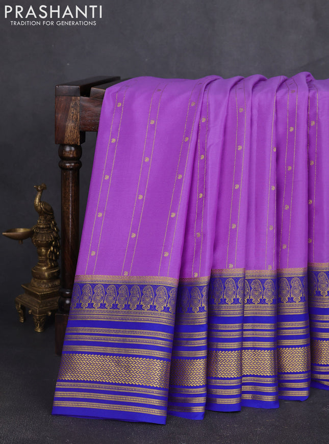 Pure mysore silk sareee lavender and blue with allover zari weaves and long zari woven border
