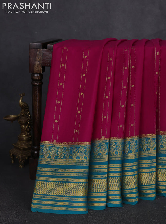 Pure mysore silk sareee pink and teal green with allover zari weaves and long zari woven border