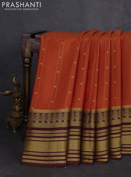 Pure mysore silk sareee rust shade and coffee brown with allover zari weaves and long zari woven border