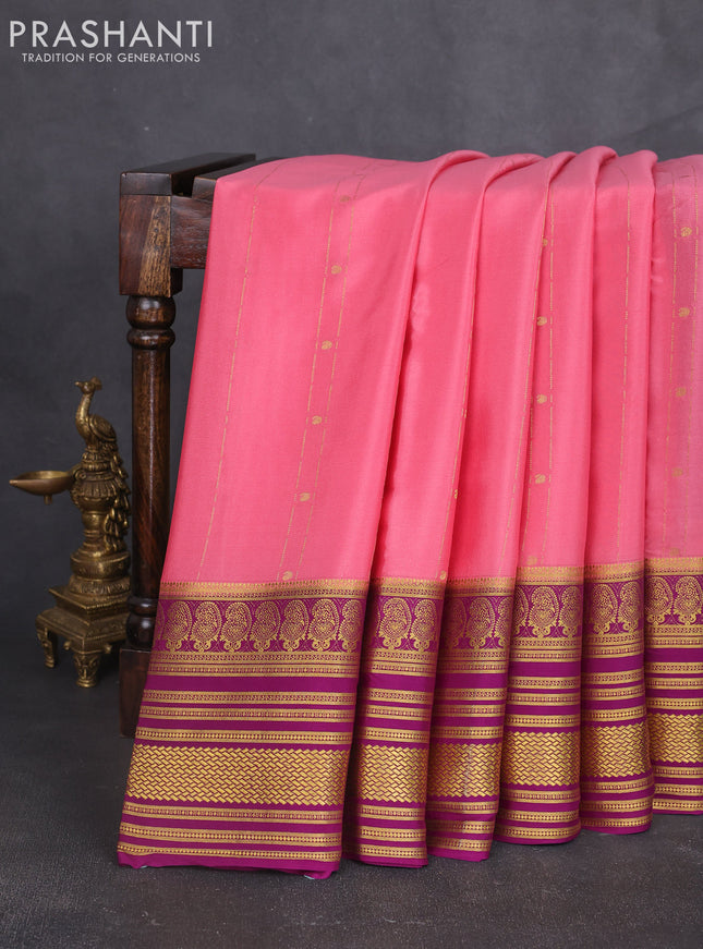 Pure mysore silk sareee peach pink and purple with allover zari weaves and long zari woven border