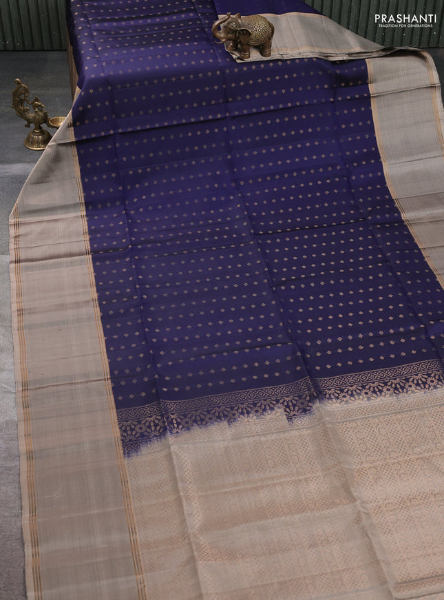Pure soft silk saree navy blue and beige with allover zari woven buttas and long rettapet zari woven border