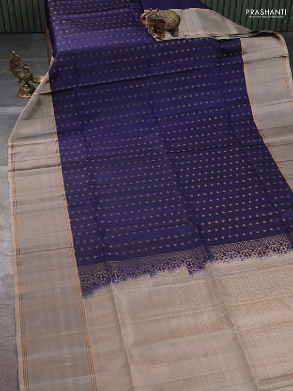 Pure soft silk saree navy blue and beige with allover zari woven buttas and long rettapet zari woven border
