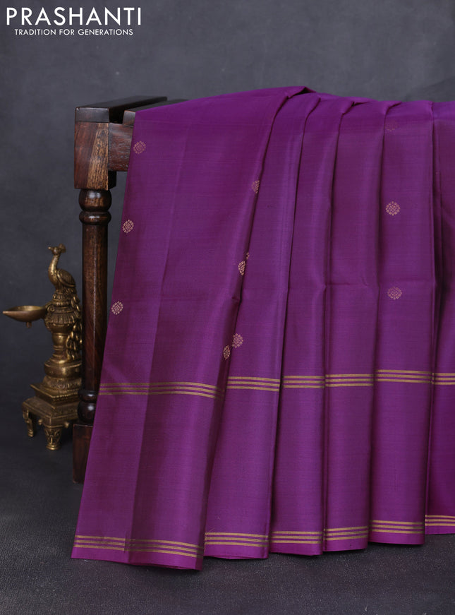 Pure soft silk saree purple with allover zari woven buttas and long rettapet zari woven border