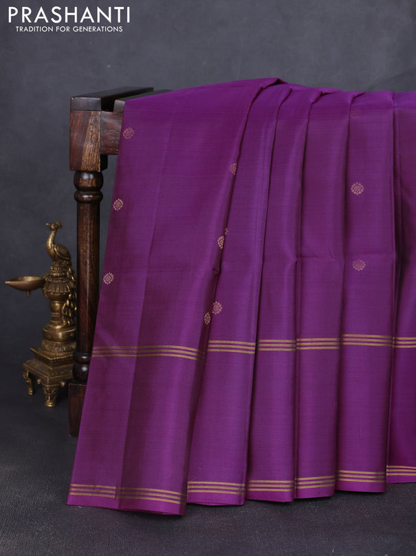 Pure soft silk saree purple with allover zari woven buttas and long rettapet zari woven border