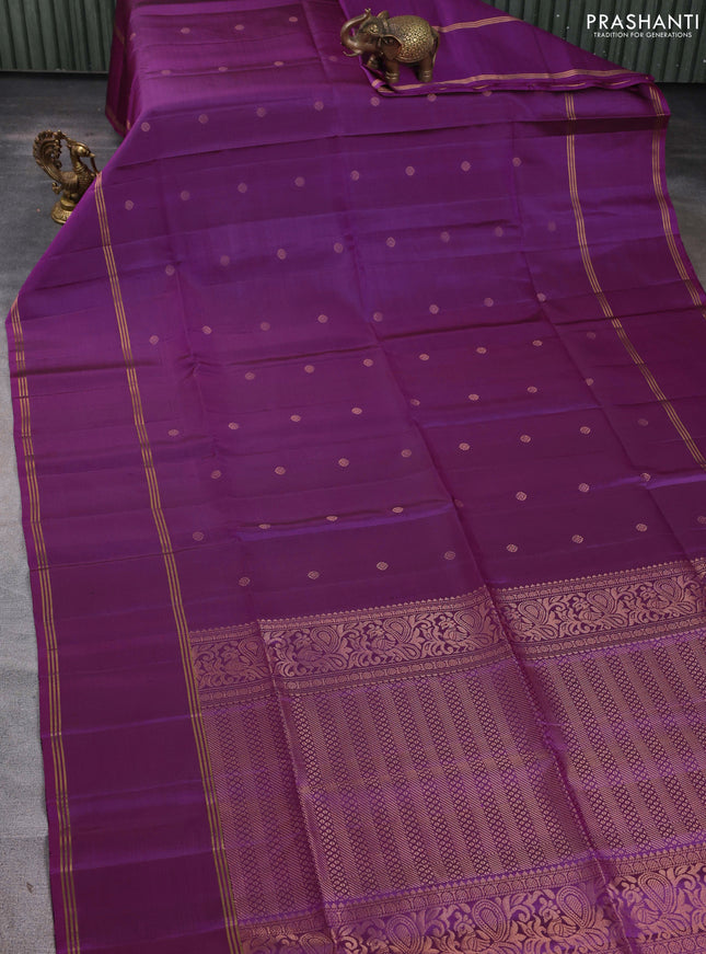 Pure soft silk saree purple with allover zari woven buttas and long rettapet zari woven border