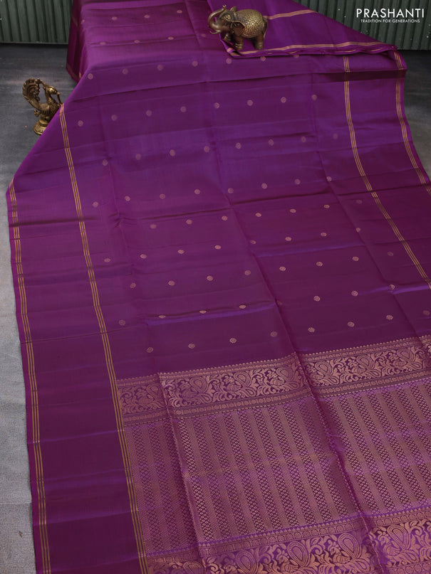 Pure soft silk saree purple with allover zari woven buttas and long rettapet zari woven border