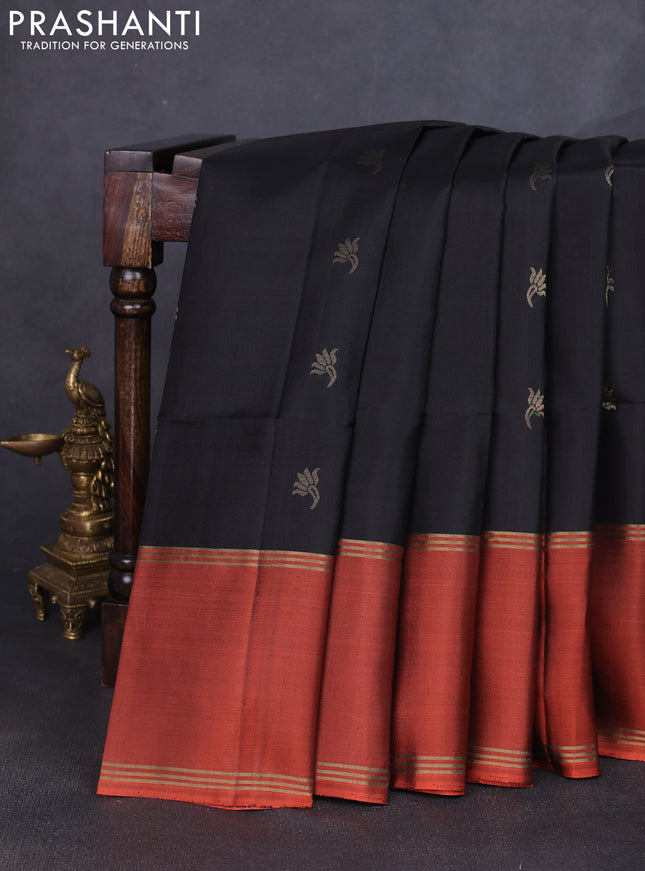 Pure soft silk saree black and rust shade with allover zari woven buttas and rettapet zari woven border