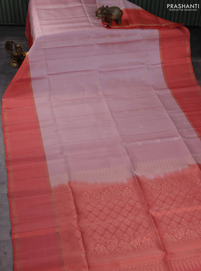 Pure soft silk saree pastel pink and orange with allover zari woven buttas and rettapet zari woven border