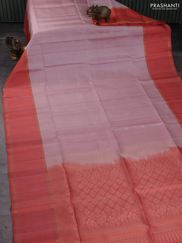 Pure soft silk saree pastel pink and orange with allover zari woven buttas and rettapet zari woven border