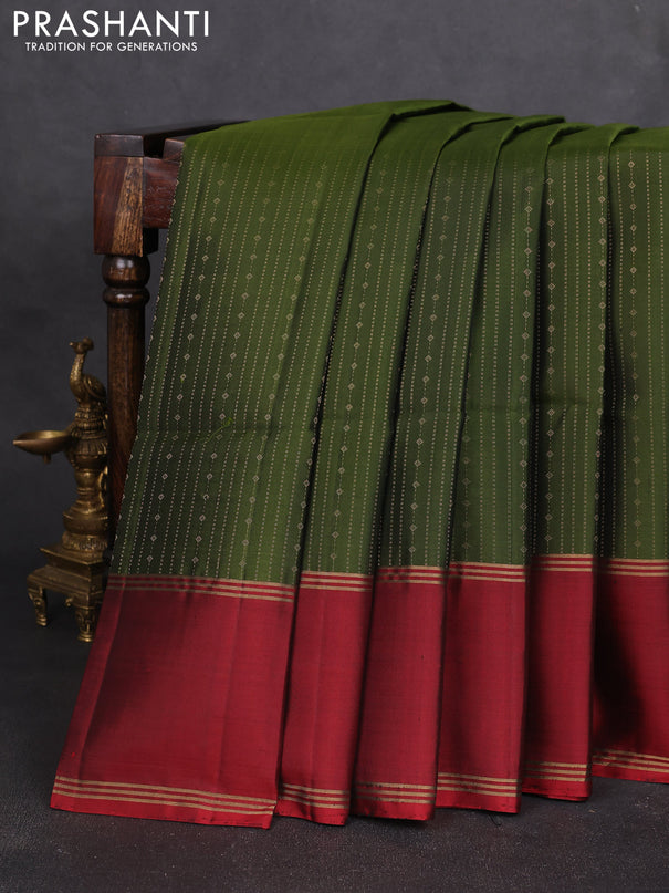 Pure soft silk saree sap green and maroon with allover zari weaves and rettapet zari woven border