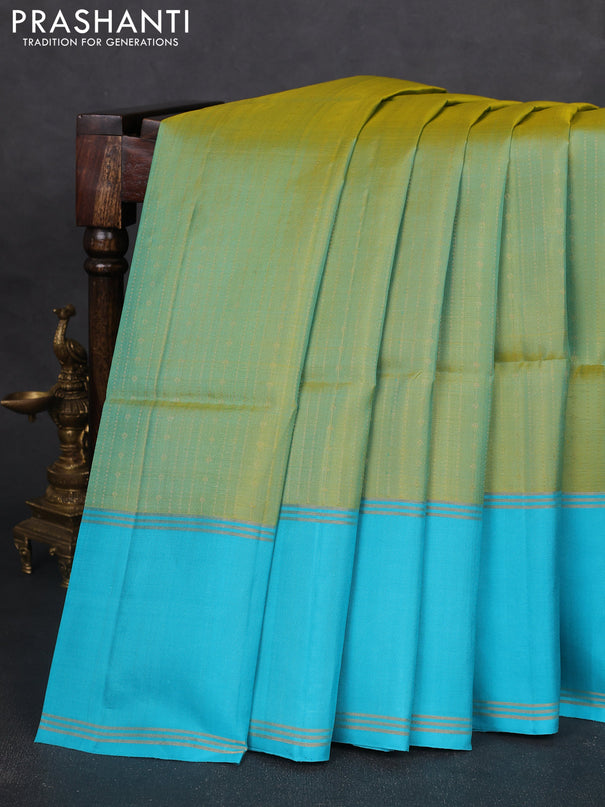 Pure soft silk saree dual shade of light green and light blue with allover zari weaves and rettapet zari woven border