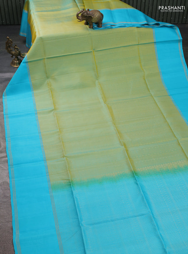 Pure soft silk saree dual shade of light green and light blue with allover zari weaves and rettapet zari woven border