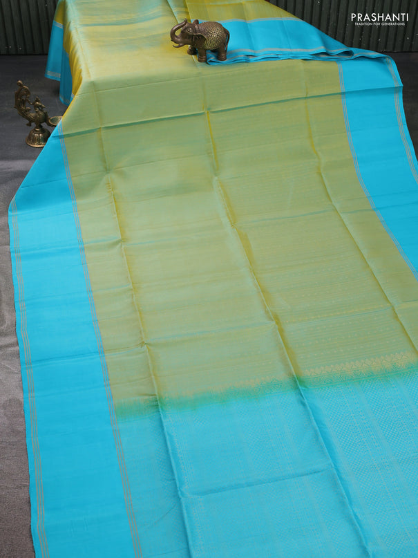 Pure soft silk saree dual shade of light green and light blue with allover zari weaves and rettapet zari woven border