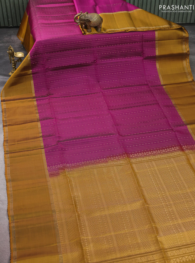 Pure soft silk saree purple and dark mustard with allover zari weaves and rettapet zari woven border