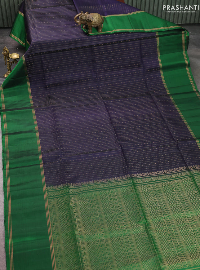 Pure soft silk saree navy blue and green with allover zari weaves and rettapet zari woven border