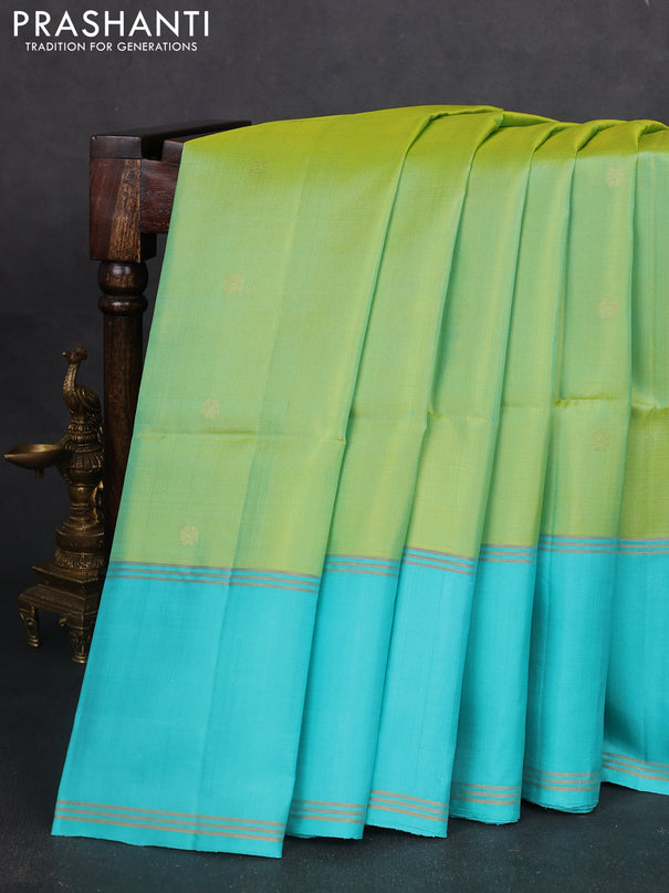 Pure soft silk saree dual shade of lime green and teal blue with zari woven buttas and long rettapet zari woven border