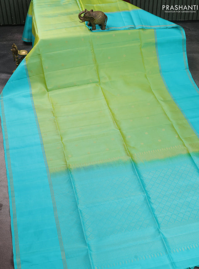 Pure soft silk saree dual shade of lime green and teal blue with zari woven buttas and long rettapet zari woven border