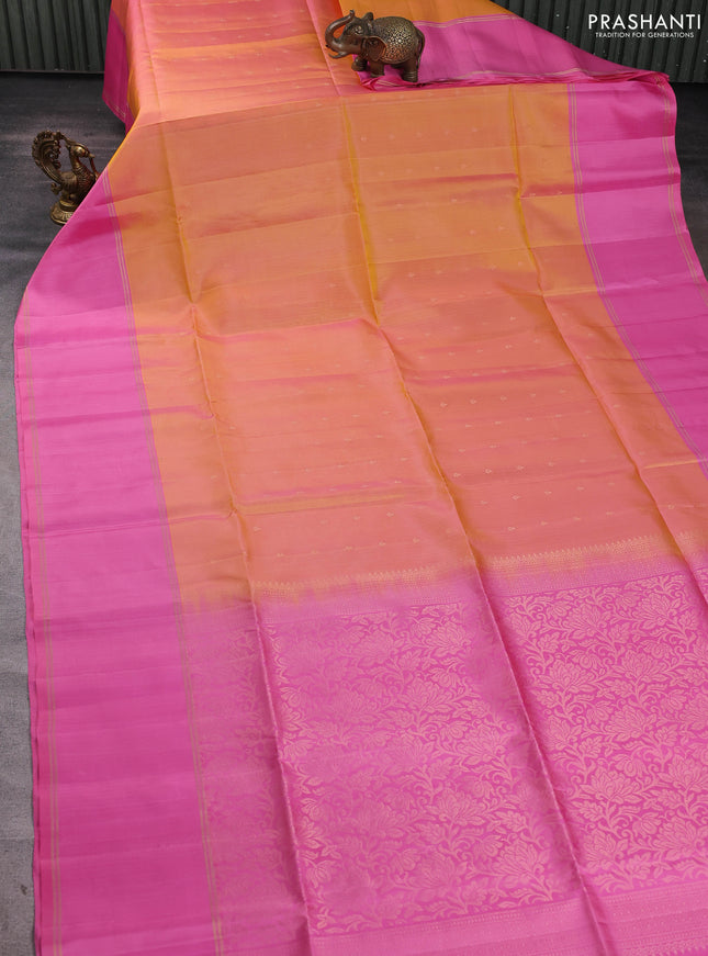 Pure soft silk saree dual shade of pinkish yellow and light pink with allover zari woven buttas and long rettapet zari woven border
