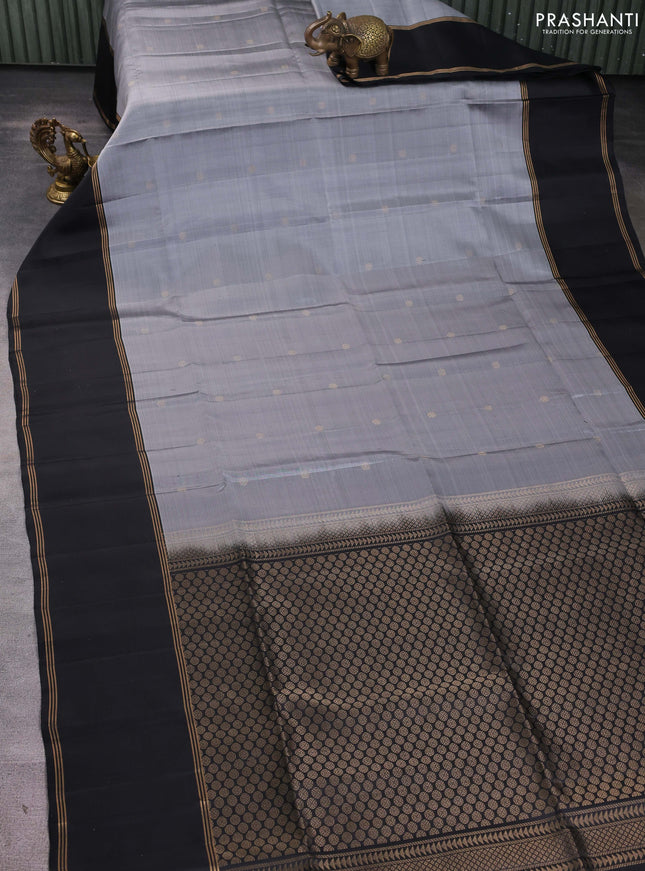 Pure soft silk saree grey and black with allover zari weaves and long rettapet zari woven border