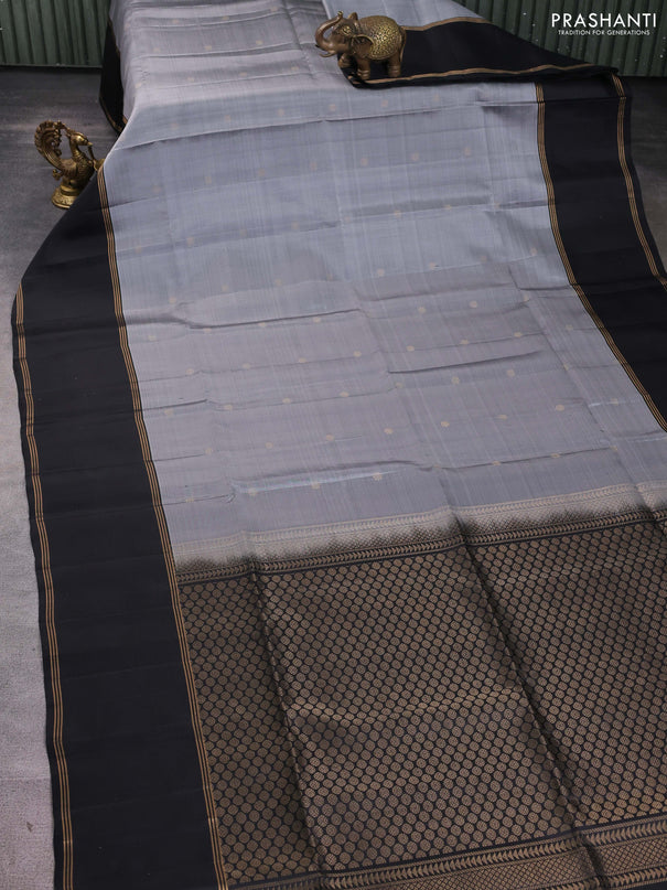 Pure soft silk saree grey and black with allover zari weaves and long rettapet zari woven border
