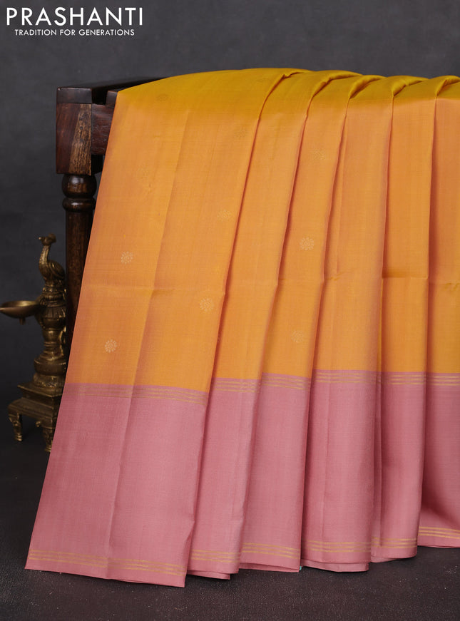 Pure soft silk saree yellow and pastel peach with zari woven buttas and long rettapet zari woven border