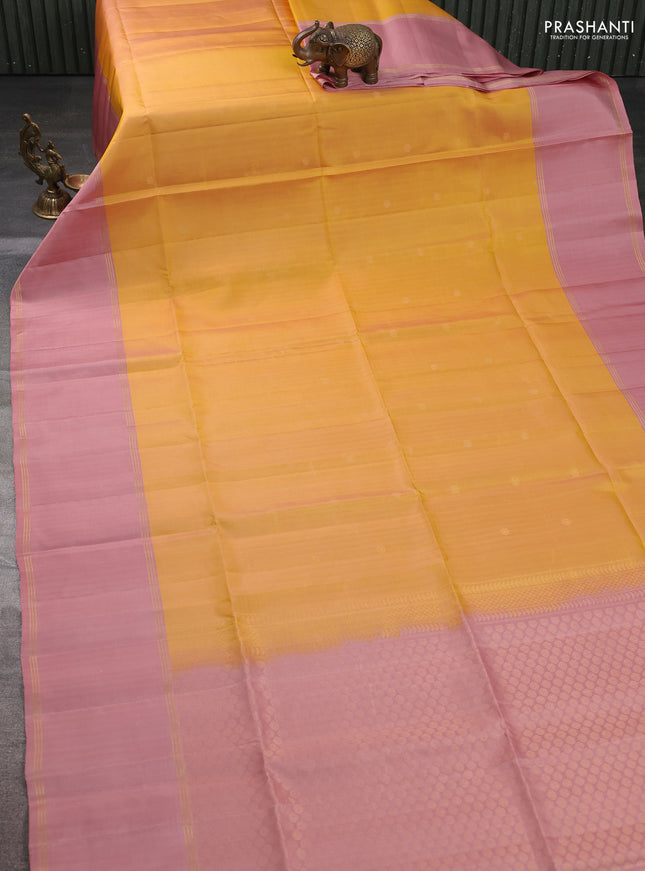 Pure soft silk saree yellow and pastel peach with zari woven buttas and long rettapet zari woven border