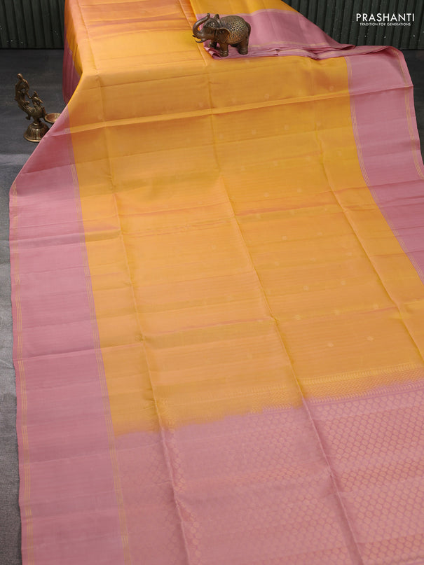 Pure soft silk saree yellow and pastel peach with zari woven buttas and long rettapet zari woven border