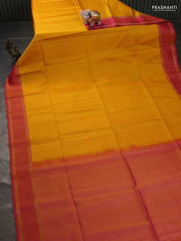 Pure soft silk saree yellow and dual shade of pinkish yellow with allover zari woven buttas and rettapet zari woven border