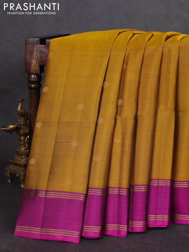 Pure soft silk saree dark mustard and pink with zari woven buttas and rettapet zari woven border